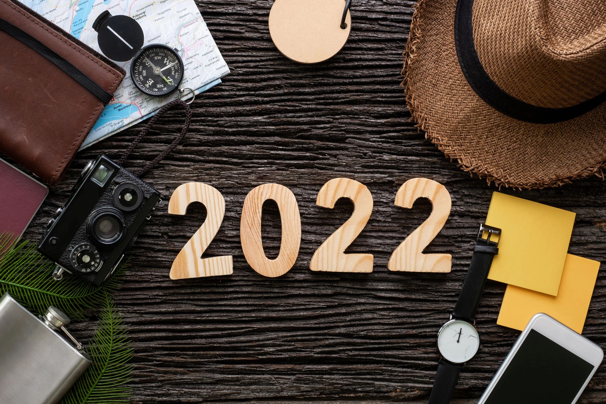 Travel planning accessories on a table